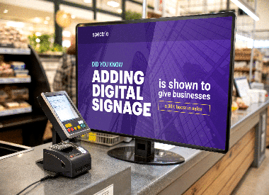 A desktop screen with text 'Adding digital signage' to your business in the USA